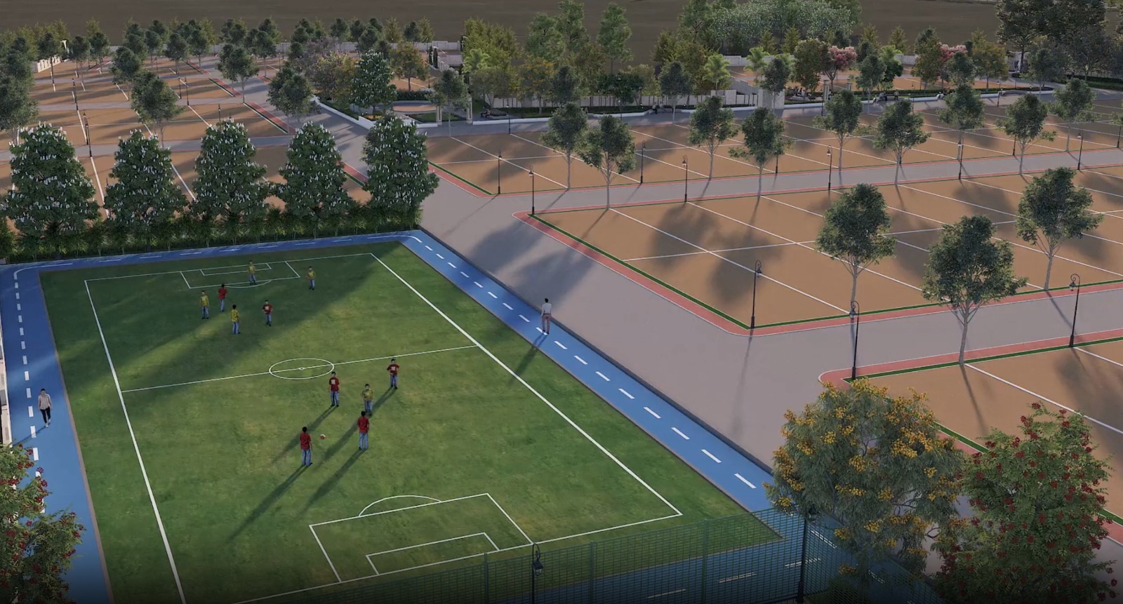 An aerial view of the Eden Garden layout: marked plots on tree-lined internal roads, with a football field and a jogging track along one edge.
