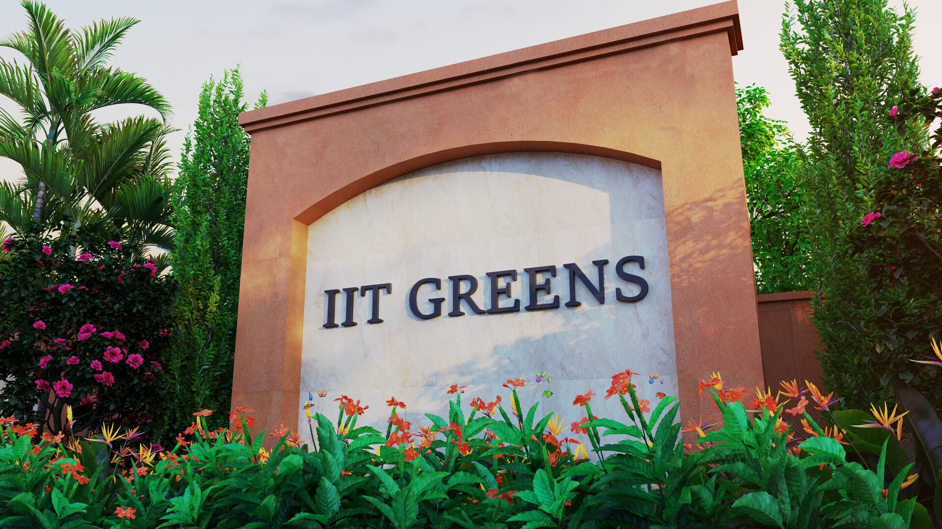 A rendering of the IIT Greens entrance: the project name on an arched terracotta wall, with flowering beds and palms either side.