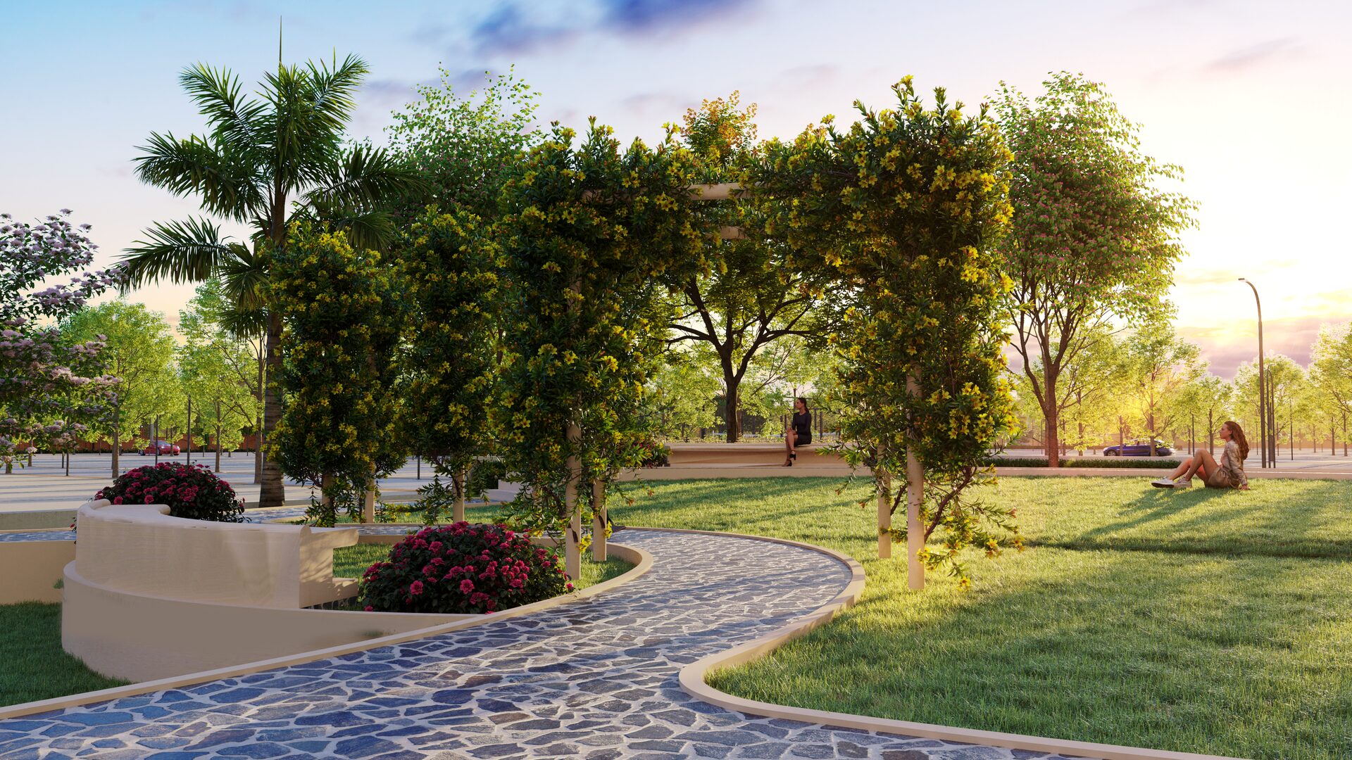 A rendering of a garden walk at IIT Greens: a stone path curving between lawns, flowering beds and trees in low evening sun.