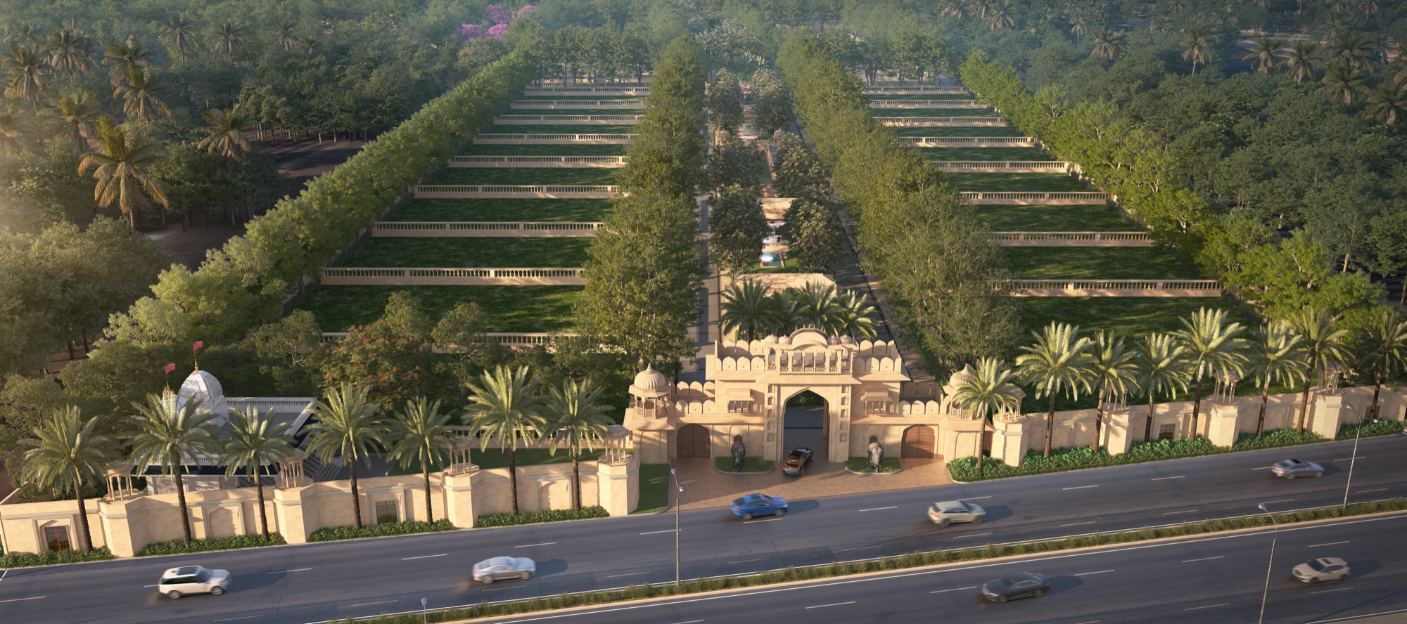 Oscar Palace seen from above: the arched entrance gate on the highway, with tree-lined internal avenues and green open spaces behind it.