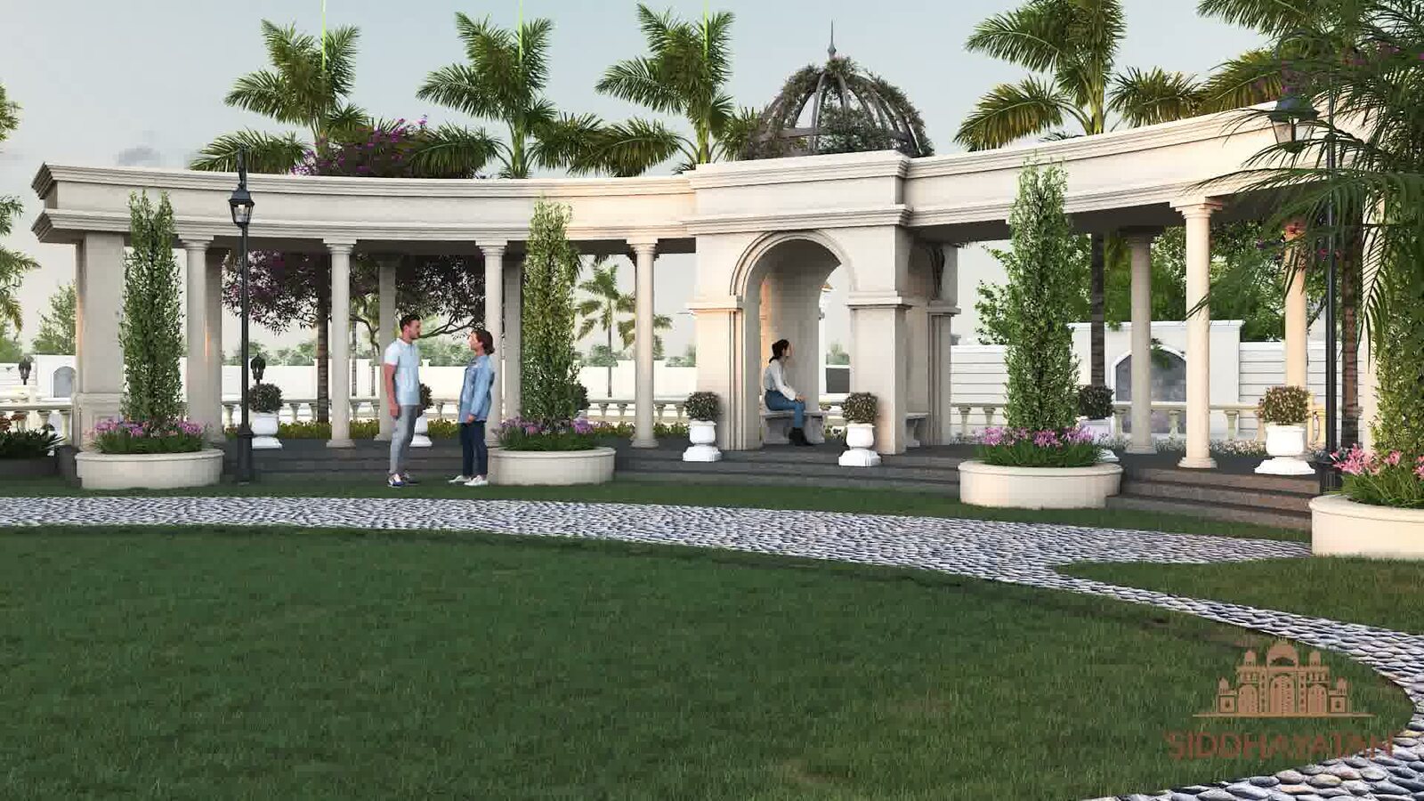 A rendering of the colonnade at Siddhayatan: a curved run of white columns and lanterns around a landscaped lawn, with palms behind.