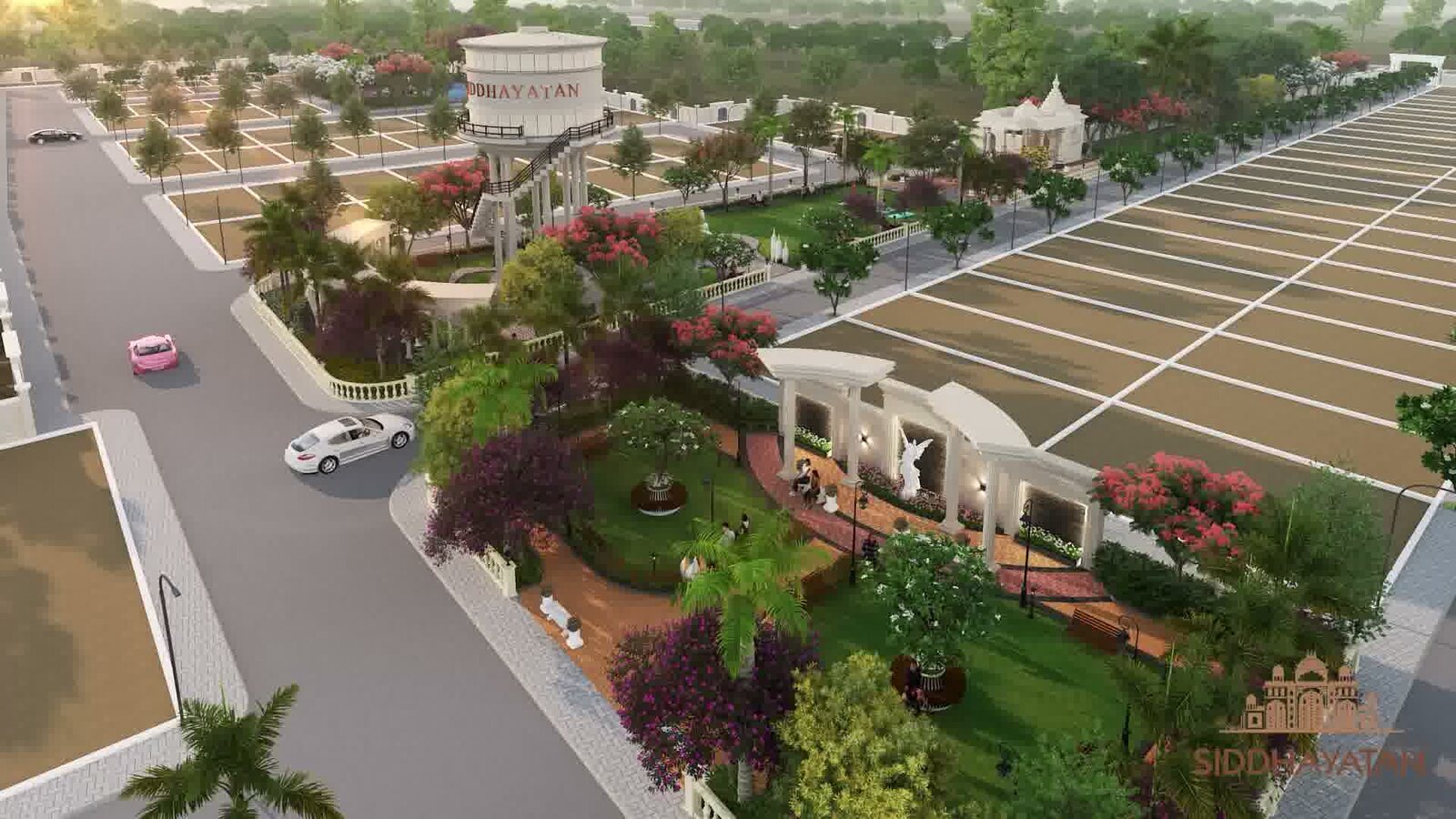 A rendering of Siddhayatan from above: marked plots in rows beside wide internal roads, with a landscaped garden, a pavilion and a water tower.